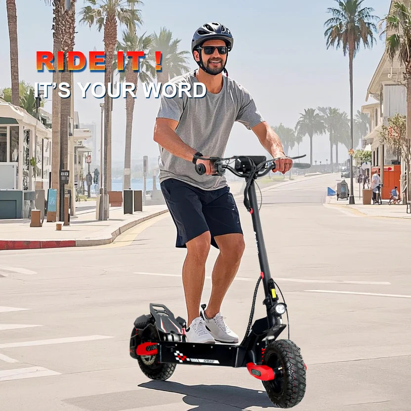 Helmeted rider on a Red EOEOTWO GT06 electric scooter along a palm-lined street